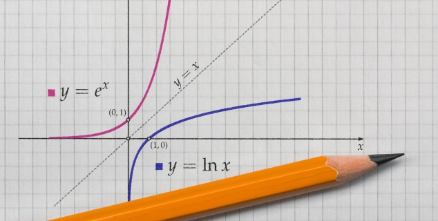 Bilde som viser en graf på et ruteark, over arket ligger det en blyant